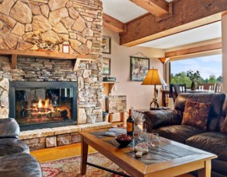 Lodge interior living room with fireplace 