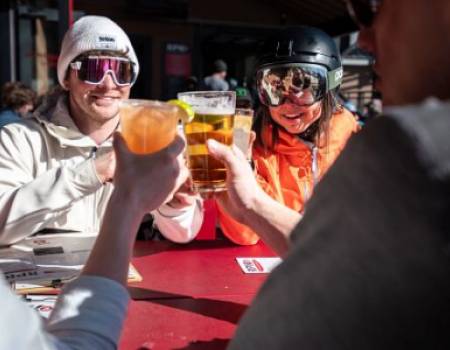 Skiers enjoying apres drinks